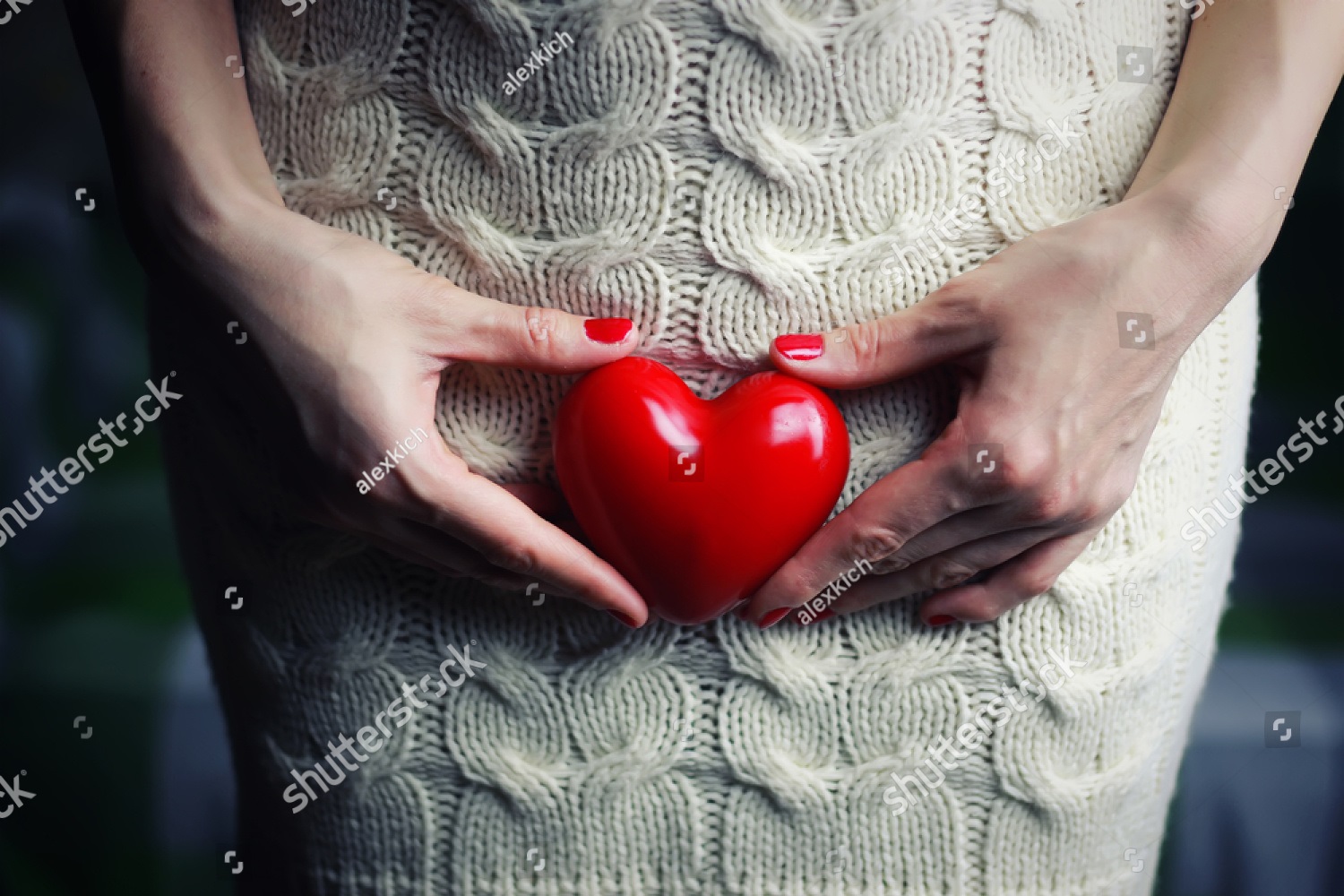 stock-photo-hand-female-holding-intim-heart-415478611.jpg