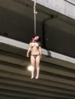 Half-naked-woman-hanged-on-a-bridge-3.jpeg